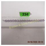 LADIES STERLING SILVER AND PINK TOPAZ BRACELET