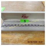 LADIES STERLING SILVER AND PURPLE AMETHYST