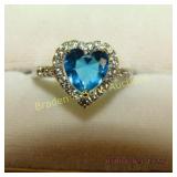 LADIES STERLING SILVER AND BLUE TOPAZ RING.