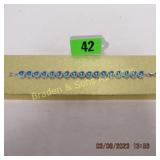 LADIES STERLING SILVER AND BLUE TOPAZ BRACELET