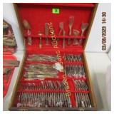 LARGE GROUP OF BRASS FLATWARE WITH CASE