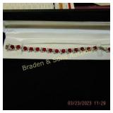 LADIES STERLING SILVER AND RUBY BRACELET