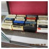 GROUP OF 24- 8 TRACK TAPES AND CARRYING CASE.
