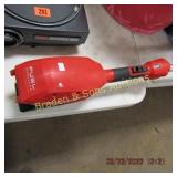 USED MILWAKEE BATTERY OPERATED WEEDEATER.