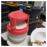 PLASTIC BARREL AND PIG WATERER.