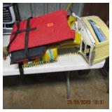 TWO USED LIFE JACKETS AND ONE BOAT