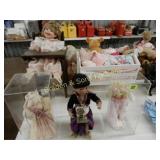 TABLE OF ASSTD COLLECTIBLE DOLLS