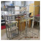 GROUP OF TWO CLOTHES RACKS AND ONE PLASTIC