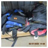 GROUP OF 2 USED LIFE JACKETS AND ONE FLOAT