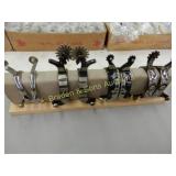 GROUP OF 4 PAIRS OF NEW WESTERN SPURS (SPUR STAND