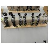 GROUP OF 4 PAIRS OF NEW WESTERN SPURS (SPUR STAND