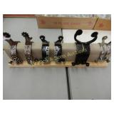 GROUP OF 4 PAIRS OF NEW WESTERN SPURS (SPUR STAND
