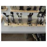 GROUP OF 4 CONTEMPORARY WESTERN SPURS (SPUR STAND