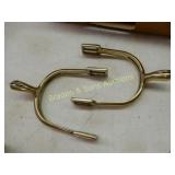 GROUP OF APPROXIMATELY 40 PAIRS OF BRASS CAVALRY