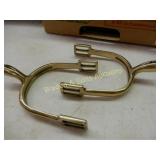 GROUP OF APPROXIMATELY 40 PAIRS OF BRASS CAVALRY