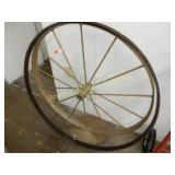 ANTIQUE WAGON WHEEL ON STAND AND ONE WAGON