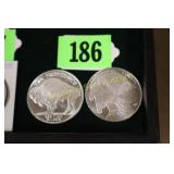 GROUP OF 2 - ONE OUNCE SILVER ROUNDS