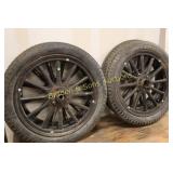 GROUP OF 4 USED MODEL T WHEELS.