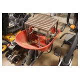 USED WHEEL BARREL AND HOSE REEL.
