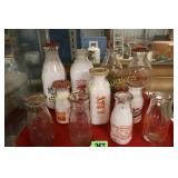 GROUP OF ASSTD MILK BOTTLES AND MILK TABS.