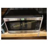 USED LIKE NEW GE MICROWAVE.