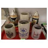 TRAY OF COLLECTIBLE BEER STEINS.
