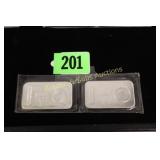 GROUP OF 2-1 OZ SILVER BARS.