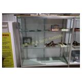 USED 72" X 60" LIGHTED SHOWCASE.