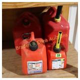 GROUP OF 4 USED GAS CANS.