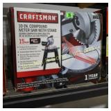 NEW CRAFTSMAN 10" MITER SAW WITH STAND.