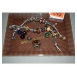 TRAY OF PANDORA BRACELETS AND RINGS