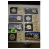 GROUP OF 8 SILVER COINS FROM VARIOUS PARTS OF