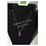 LADIES STERING SILVER WITH RED GARNET AND TOPAZ
