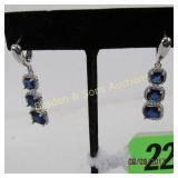 LADIES STERLING SILVER AND DARK BLUE SAPPHIRE