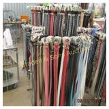 LARGE GROUP OF ASST WESTERN BELTS AND RACK