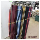 LARGE GROUP OF SUSPENDERS WITH RACK