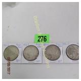 GROUP OF 4 US MORGAN SILVER DOLLARS