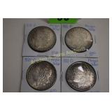 GROUP OF 4 AU QUALITY MORGAN SILVER DOLLARS