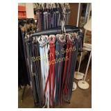 LARGE ASSORTMENT OF BELTS WITH RACK