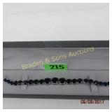 LADIES STERLING SILVER AND BLUE SAPPHIRE BRACELET