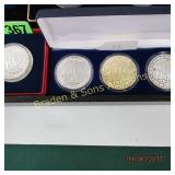 GROUP OF 4 ONE OUNCE SILVER ROUNDS