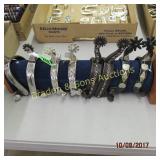 GROUP OF 4 CONTEMPORARY WESTERN SPURS WITH STAND