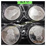 GROUP OF 4 ONE OUNCE HAPPY HOLIDAYS SILVER