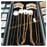 GROUP OF 2 TRAYS OF COPPER NECKLACES