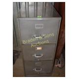 USED THREE DRAWER FILE CABINET. TOP DRAWER IS A