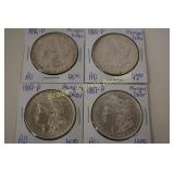 GROUP OF 4 AU QUALITY MORGAN SILVER DOLLARS.