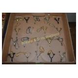 GROUP OF 19 SPUR KEYCHAINS