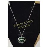 LADIES STERLING SILVER AND EMERALD NECKLACE.