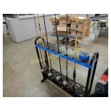 GROUP OF 6 RODS AND REELS. (STAND NOT INCLUDED)