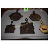GROUP OF 5 MINIATURE CAST IRON ASHTRAYS.